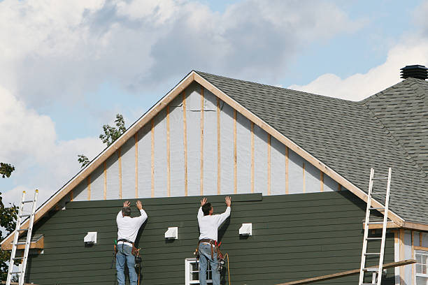 Professional Siding Installation technician working in Washington, WV
